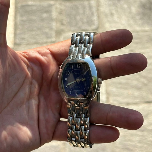 Christian D. Quartz watch with blue dial and metal bracelet