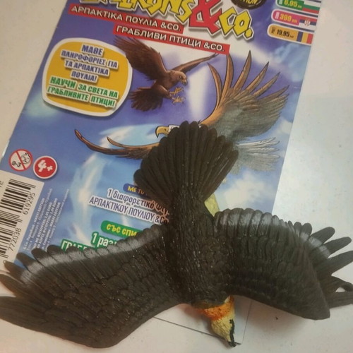 Bird of prey figure like new with leaflet