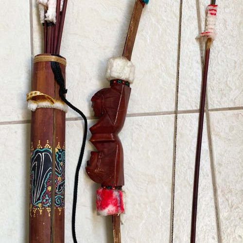 Decorative ethnic bow set with quiver and arrows used