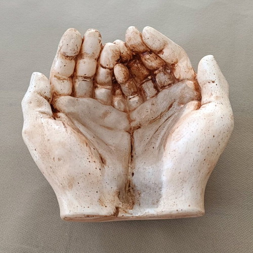 Decorative hands new, handmade art with candle heart rose