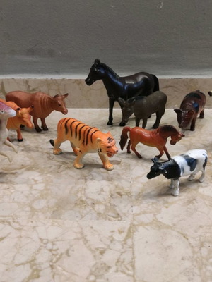 Plastic animals used, pack of 12 small and large