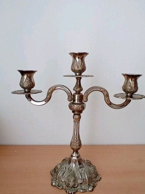 Vintage three-arm candlestick used in excellent condition