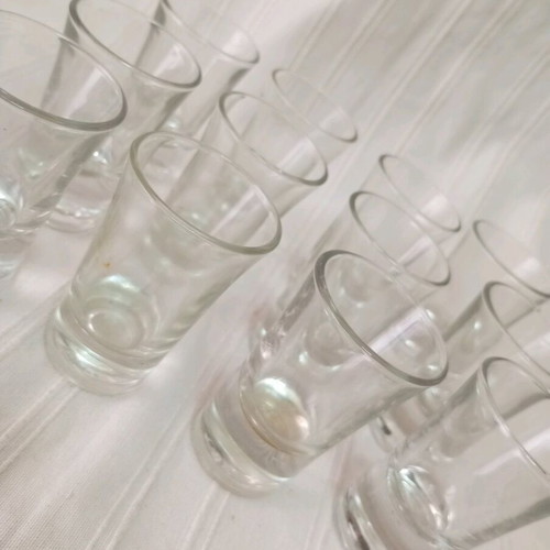 Set of 12 shot glasses like new, thick glass