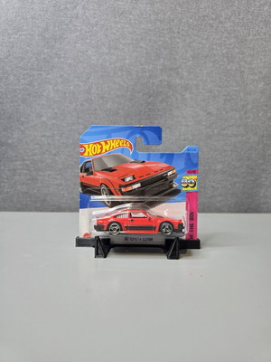 Hot Wheels 82 Toyota Supra toy car with slight hook wear