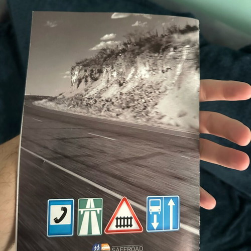 Book with motorcycle signs intact