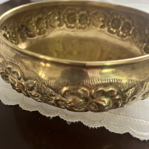 Vintage brass jewelry box used with embossed floral motifs