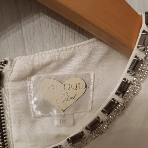 White sleeveless blouse with beads like new, size 152 cm