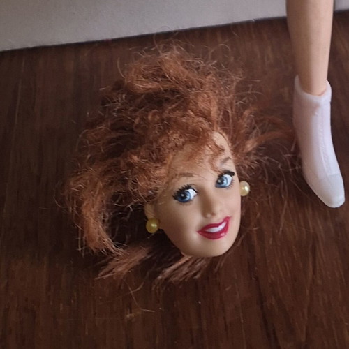 Vintage Barbie Lucy with extra head and vintage clothes used