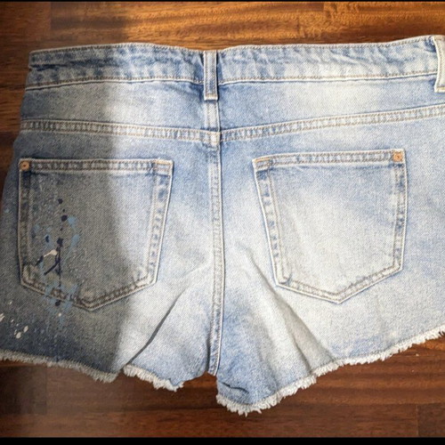 Bershka denim jean shorts like new with rips and paint splatters, size 38