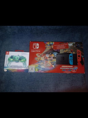 Nintendo Switch console with controller, Mario Kart Deluxe 8 code