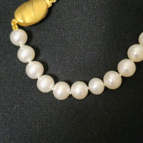 Pearl necklace new with 14K gold clasp