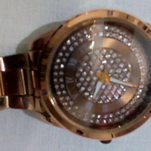 Wristwatch rose gold used with bracelet and rhinestones
