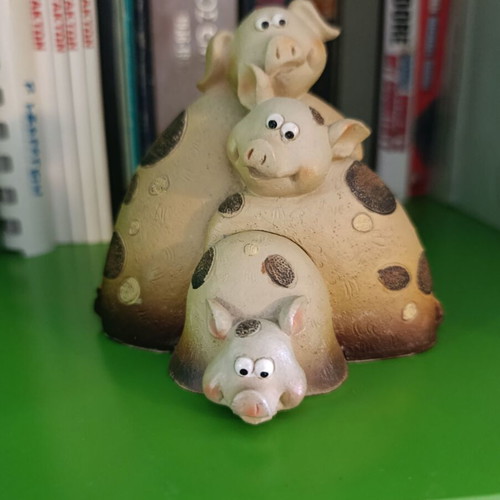 Decorative three pig figurines used, resin
