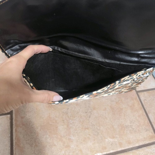Envelope bag like new with animal print