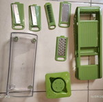 Vegetable mandoline used with collection container