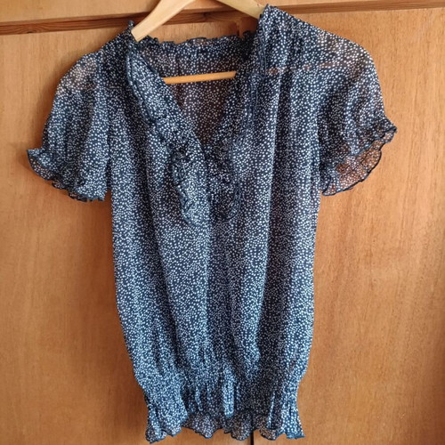 Blue polka dot chiffon blouse with ruffles and smocked waist, like new