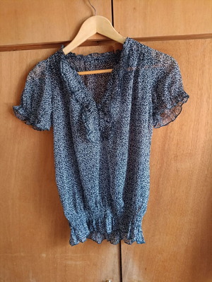 Blue polka dot chiffon blouse with ruffles and smocked waist, like new