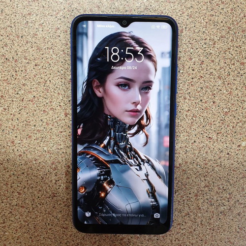 Redmi 9C smartphone with scratch-free screen, blue