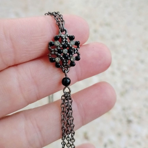 Women's chain necklace with black stones and zircon