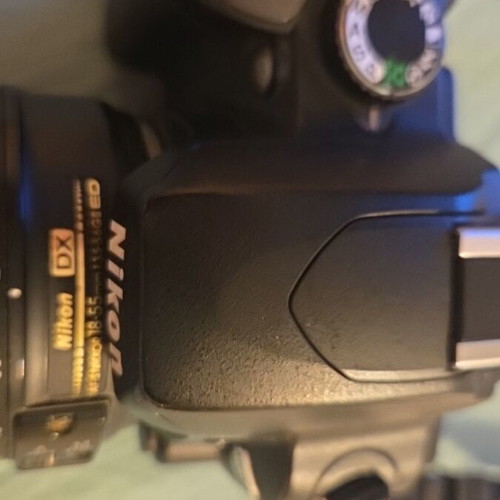 Nikon DSLR model D60 camera used with Nikon Aspherical lens