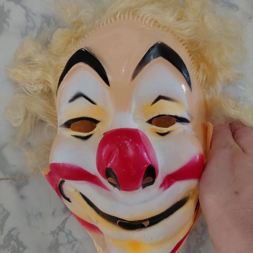 Vintage clown carnival mask from the 70s, used