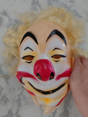 Vintage clown carnival mask from the 70s, used