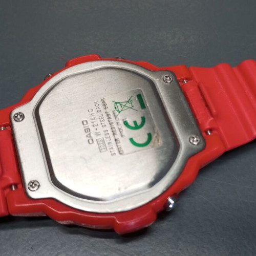 Vintage Casio Illuminator W-214HC wrist watch used, red