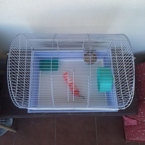 Hamster cage used, with cleaning drawer