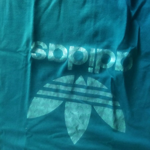 Set of two Puma and Adidas shirts like new