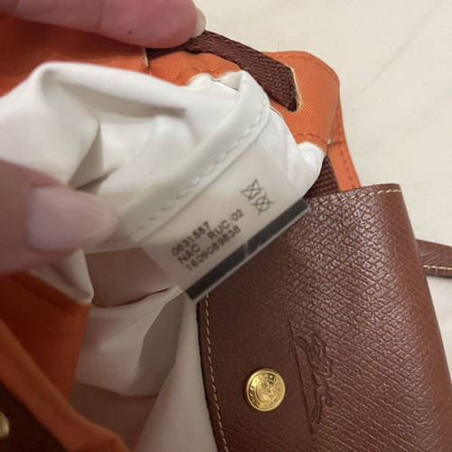Longchamp Le Pliage backpack used, orange