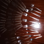 Solingen cutlery set incomplete with gold border on handles, used