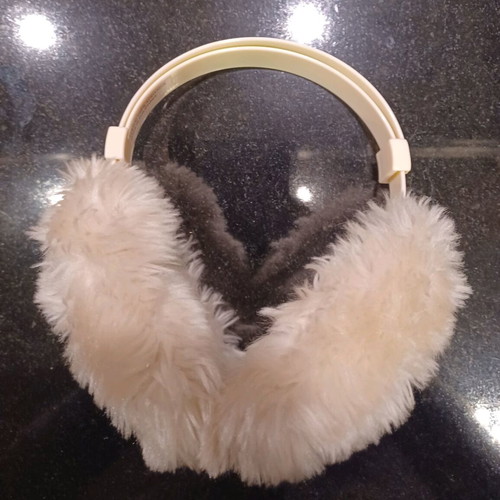 Ear protectors like new, ecru, foldable with size adjustment