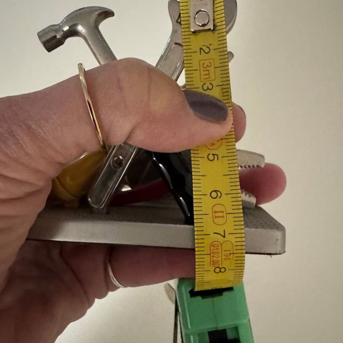 Decorative tabletop clock like new with tools theme