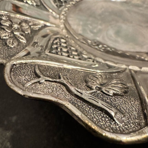 Vintage bowl with silver lining and engraved design, used