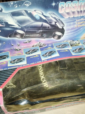 Cosmocup toy car with packaging wear
