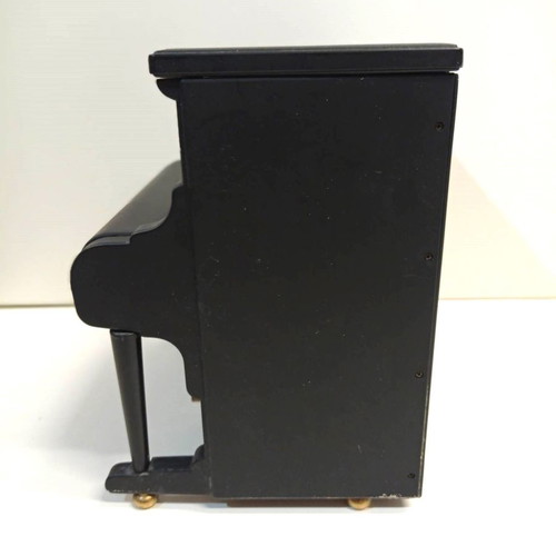 Decorative piano music box used from the 1970s with jewelry storage