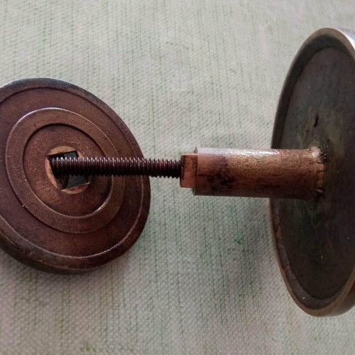 Bronze door knob used with geometric star pattern