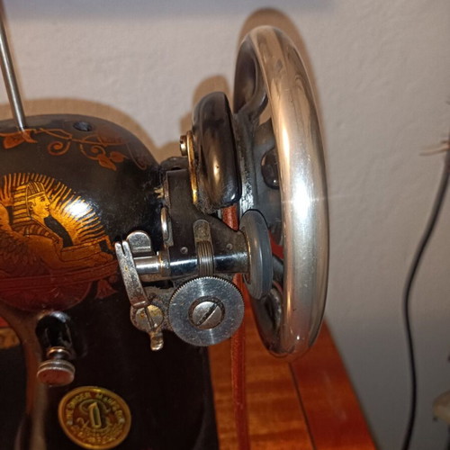 Singer Sewing Machine Model 66 like new with wooden cabinet