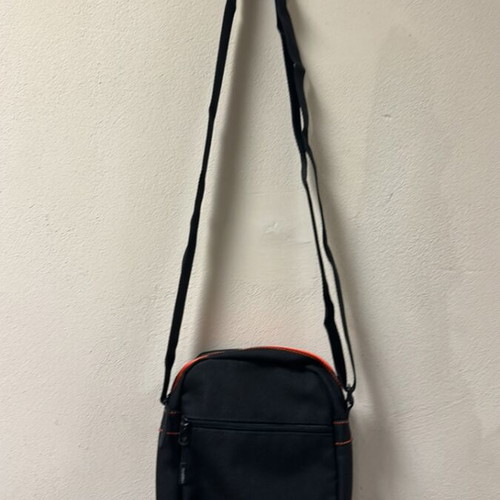 Lotto Post Active crossbody shoulder bag, black with orange and blue stripes