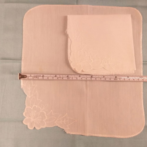 White cutwork doilies with small embroidery, pair, like new