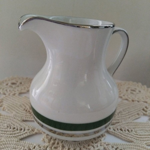 Winterling milk jug like new with silver decoration