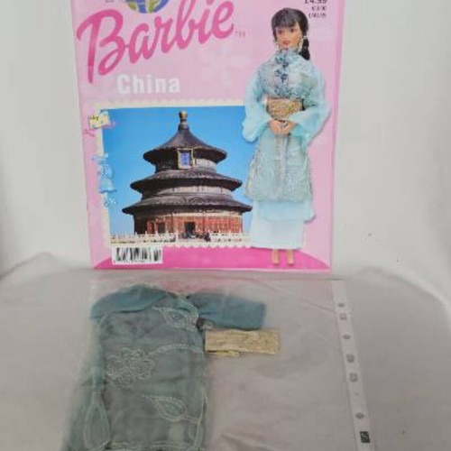Discover the world with Barbie magazine collection with doll clothes