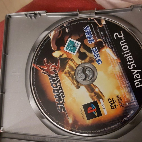 Sony PlayStation 2 console used with remote and 10 games