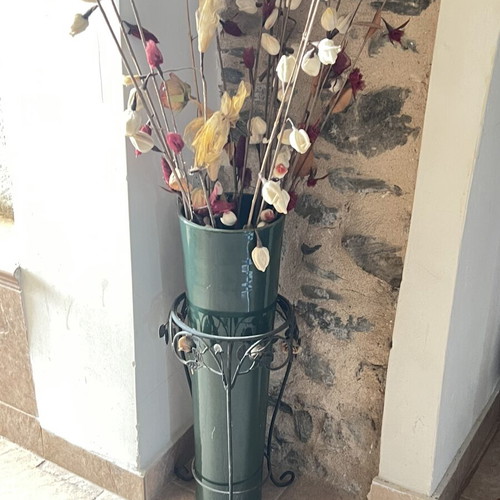 Large vintage floor decoration with dried flower arrangement