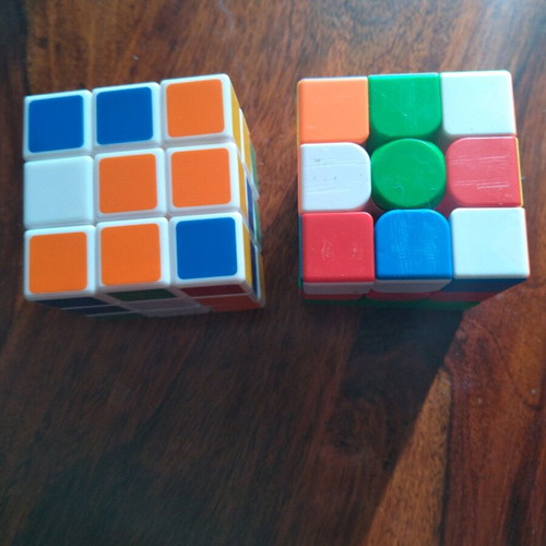 Rubik cubes used, pack of two with minor scratches