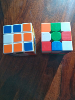 Rubik cubes used, pack of two with minor scratches