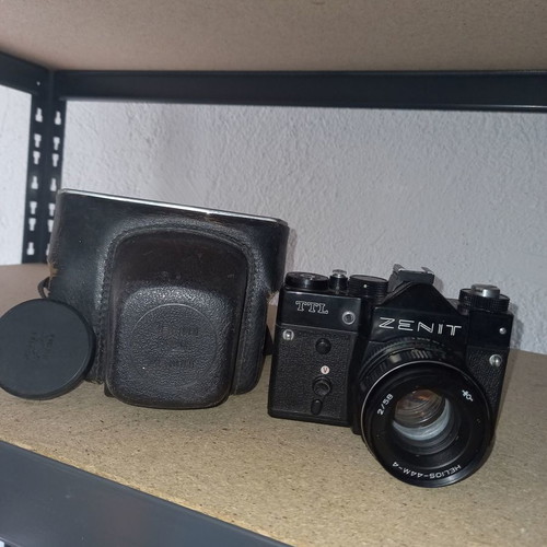Zenit TTL camera used with Helios-44M-4 lens and leather case