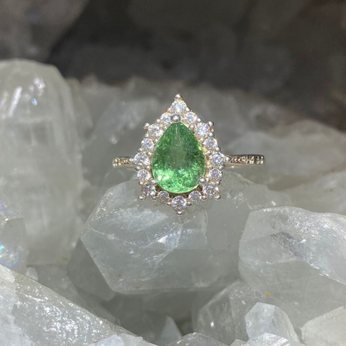 Silver ring with natural green tourmaline and moissanite