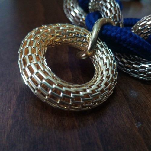 Oversized statement necklace with knitted chains used, blue and gold