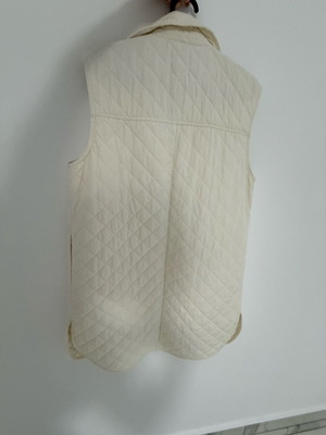 Sleeveless vest ivory size small like new